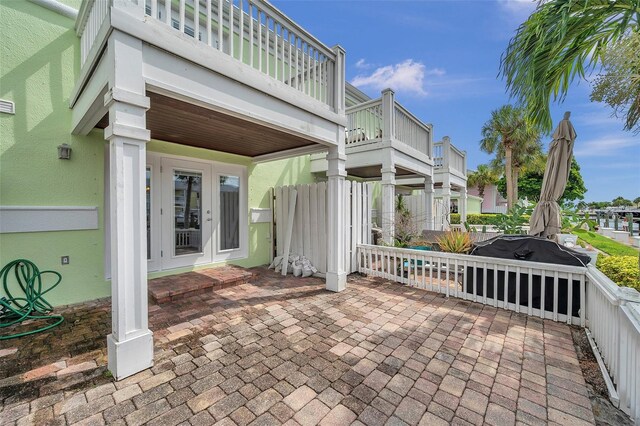 view of patio with a balcony