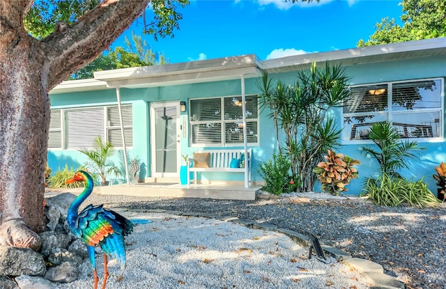 view of front of home featuring covered porch