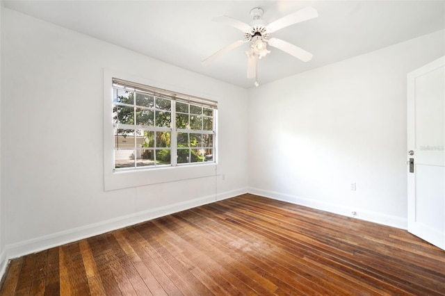 spare room featuring ceiling fan and wood-type flooring