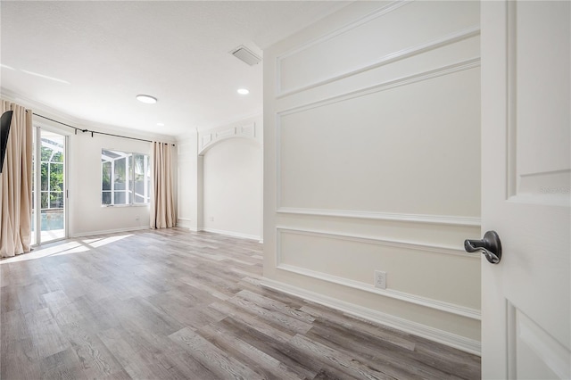 spare room with light wood-type flooring