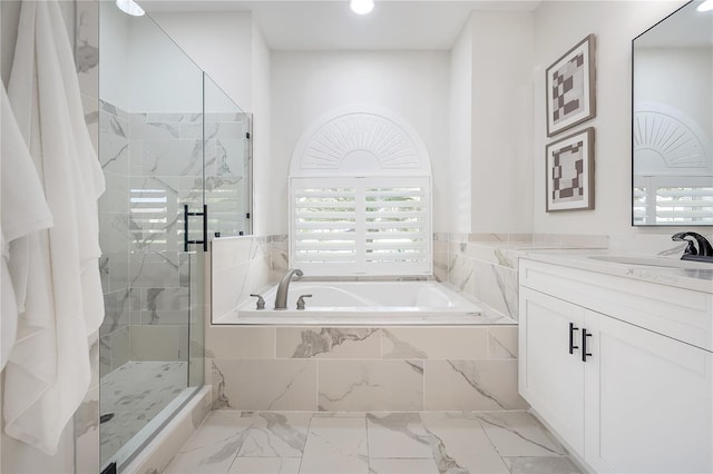 bathroom with vanity and plus walk in shower