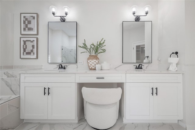 bathroom with vanity and a tub to relax in