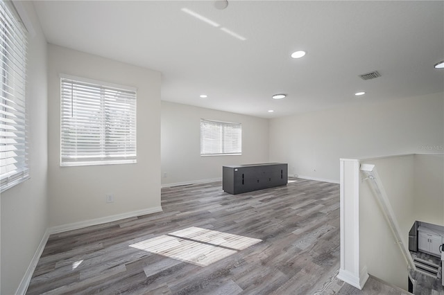 spare room with dark hardwood / wood-style flooring