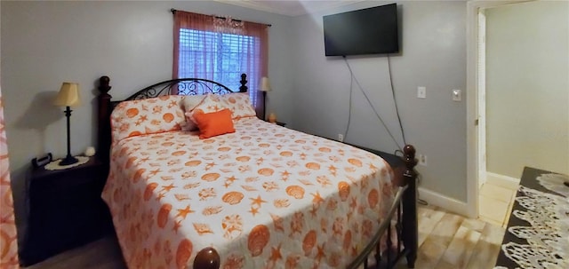 bedroom featuring hardwood / wood-style floors