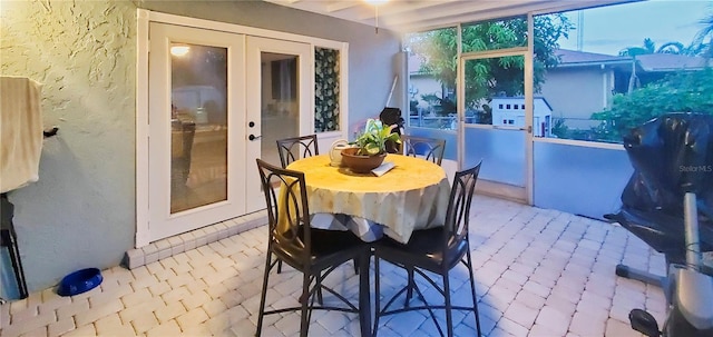 dining area featuring french doors