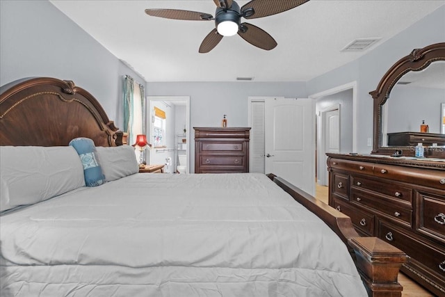 1467 Monte St, Port Charlotte, FL 33952 - bedroom with a ceiling fan, ensuite bath, a closet, and light wood-style flooring