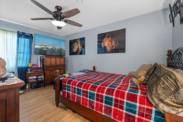 1467 Monte St, Port Charlotte, FL 33952 - bedroom with light wood finished floors and ceiling fan