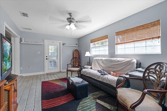 1467 Monte St, Port Charlotte, FL 33952 - living area with a ceiling fan and baseboards