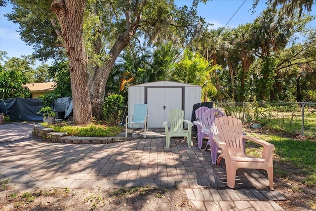 1467 Monte St, Port Charlotte, FL 33952 - wooden terrace with a patio, a storage shed, fence, and an outdoor structure
