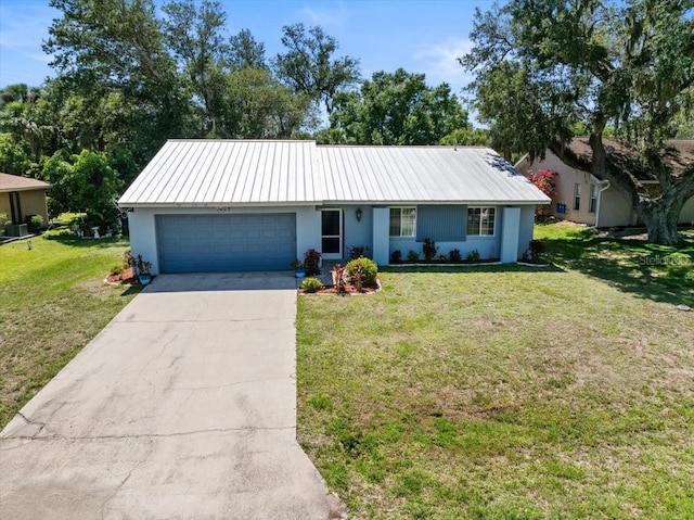 1467 Monte St, Port Charlotte, FL 33952 - ranch-style house featuring a garage, concrete driveway, a front yard, and metal roof