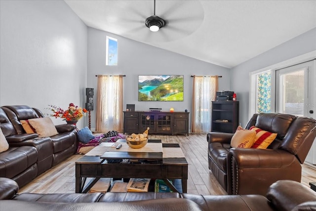 1467 Monte St, Port Charlotte, FL 33952 - living room featuring vaulted ceiling, light wood-type flooring, and ceiling fan