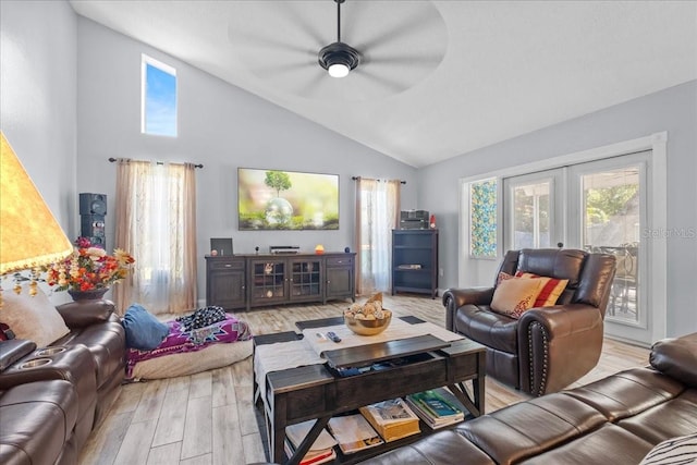 1467 Monte St, Port Charlotte, FL 33952 - living room featuring a ceiling fan, light wood finished floors, and high vaulted ceiling