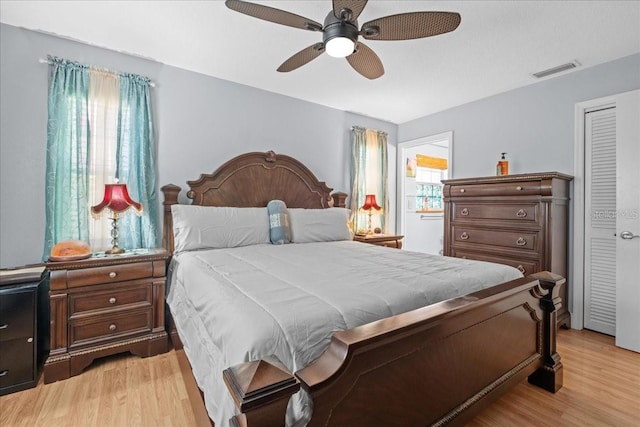 1467 Monte St, Port Charlotte, FL 33952 - bedroom with light wood finished floors and ceiling fan