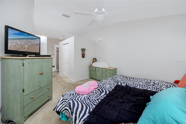 bedroom with light colored carpet and ceiling fan