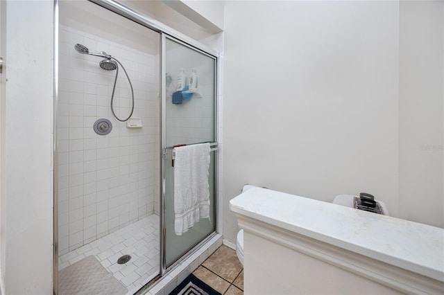 4234 Chesterfield Cir, Palm Harbor, FL 34683 - bathroom featuring a stall shower, tile patterned flooring, and vanity