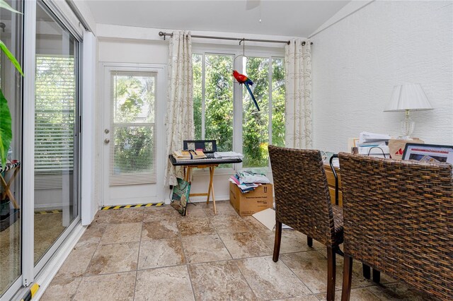 4234 Chesterfield Cir, Palm Harbor, FL 34683 - home office with stone tile flooring and ceiling fan