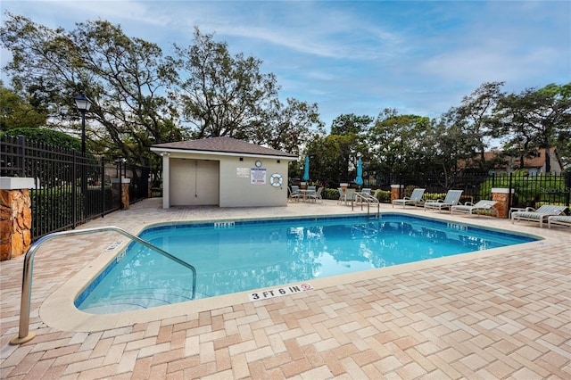4234 Chesterfield Cir, Palm Harbor, FL 34683 - community pool with a patio
