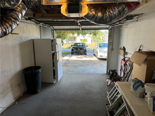 garage featuring a garage door opener