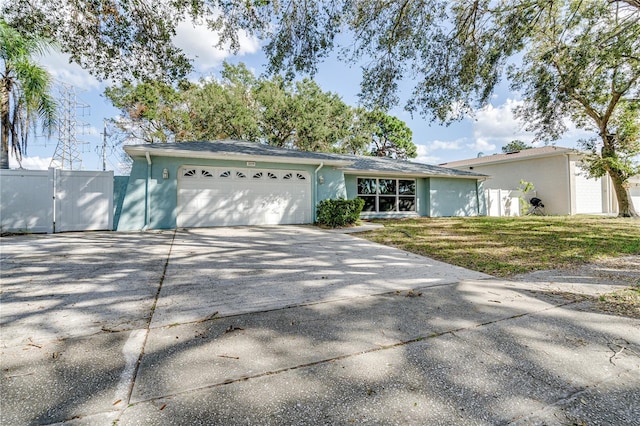 single story home featuring a garage