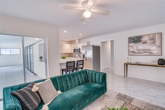 living room featuring crown molding, light tile patterned flooring, and ceiling fan