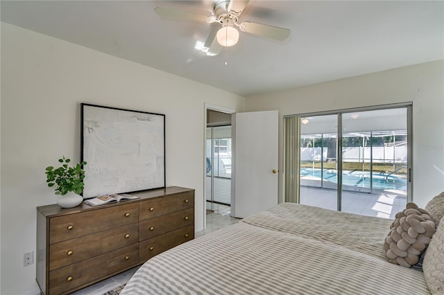 bedroom with ceiling fan, light tile patterned floors, and access to exterior