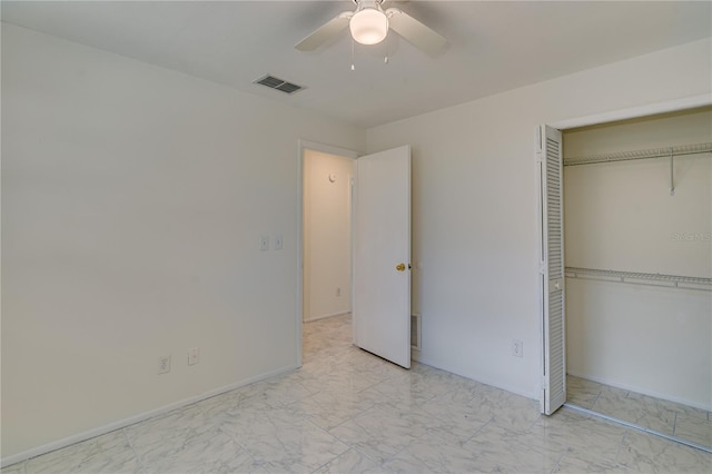 unfurnished bedroom with a closet and ceiling fan