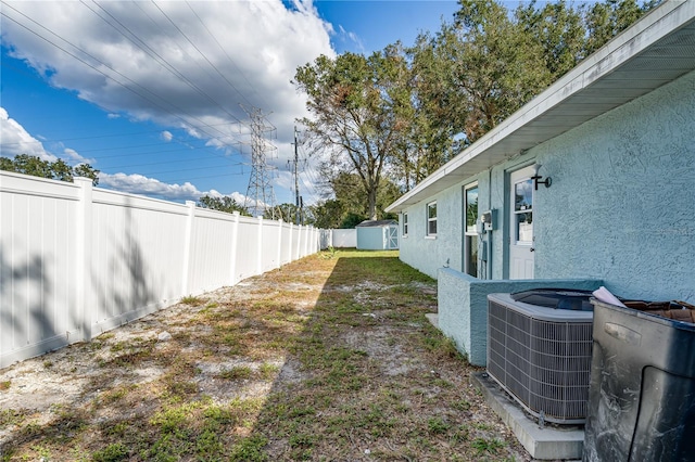 view of yard featuring cooling unit