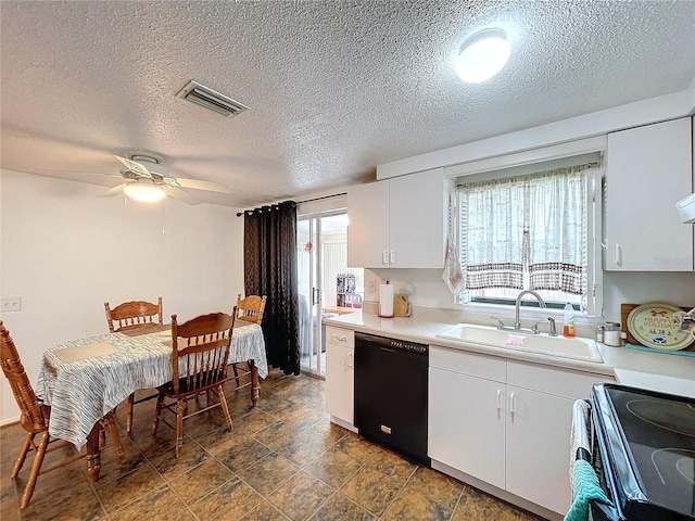 kitchen featuring white cabinetry, black dishwasher, sink, and a textured ceiling