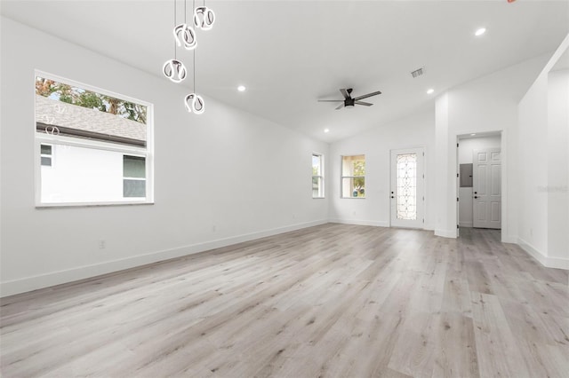 unfurnished living room featuring high vaulted ceiling, ceiling fan, and light hardwood / wood-style flooring