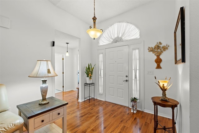 foyer entrance featuring hardwood / wood-style floors