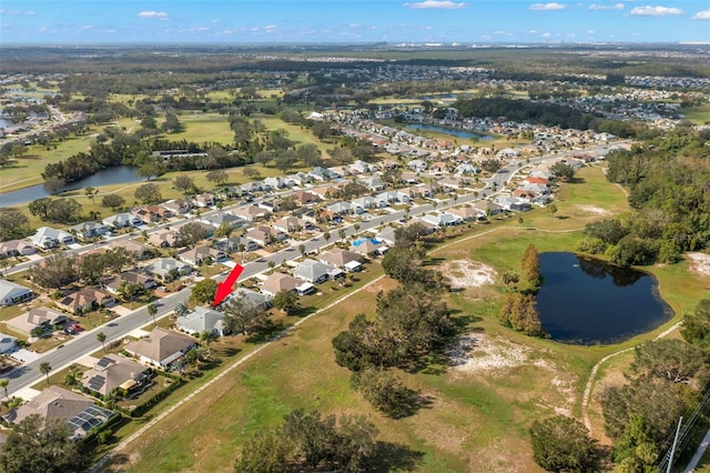 drone / aerial view featuring a water view