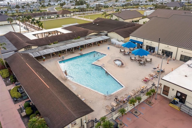 view of swimming pool featuring a patio