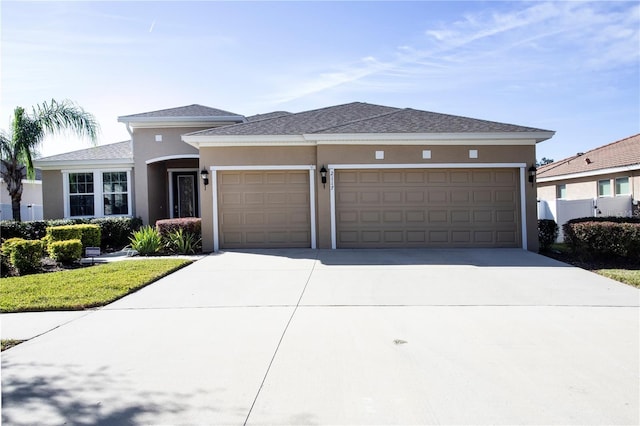 prairie-style house with a garage