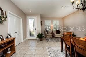 entrance foyer with an inviting chandelier