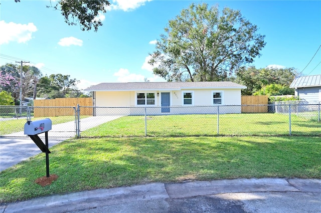 view of front facade with a front yard