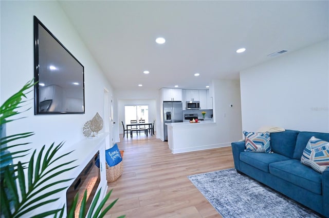 living room featuring light hardwood / wood-style floors