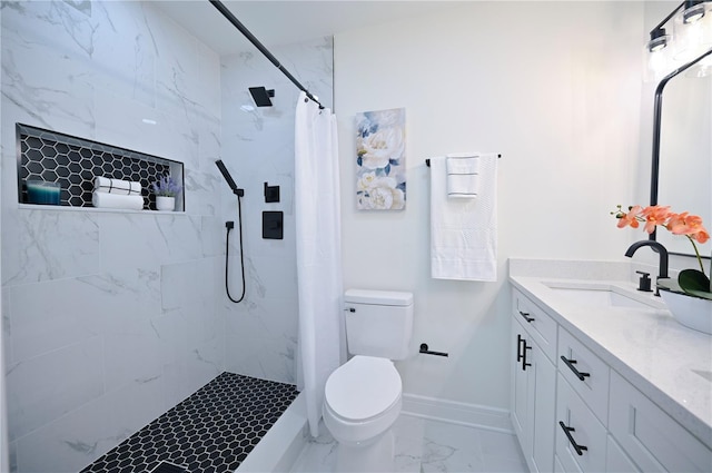 bathroom with vanity, toilet, and a shower with shower curtain