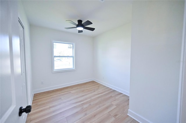 spare room with light hardwood / wood-style floors and ceiling fan