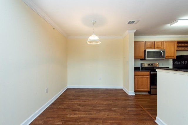 kitchen with appliances with stainless steel finishes, crown molding, dark hardwood / wood-style floors, and pendant lighting