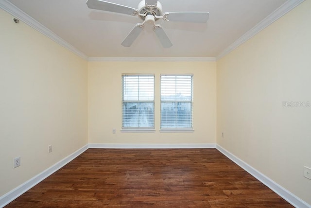 spare room featuring ornamental molding, dark hardwood / wood-style floors, and ceiling fan