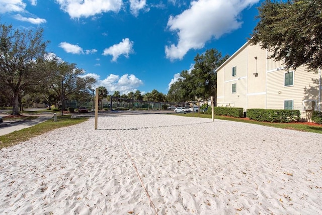 surrounding community featuring volleyball court