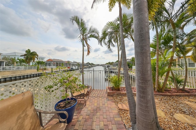 view of patio featuring a water view