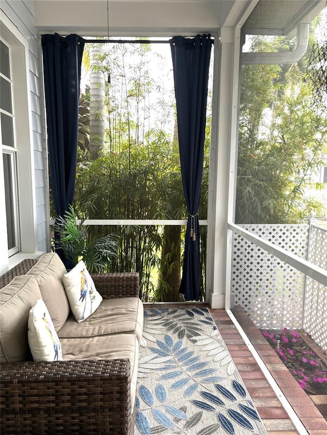 sunroom with plenty of natural light