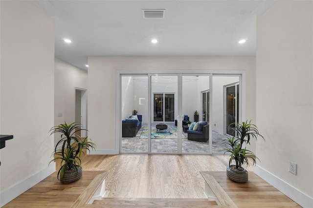 interior space with hardwood / wood-style floors