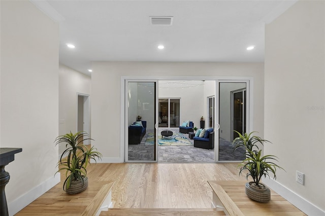 interior space with hardwood / wood-style floors