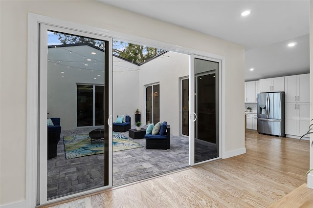 doorway featuring light wood-type flooring