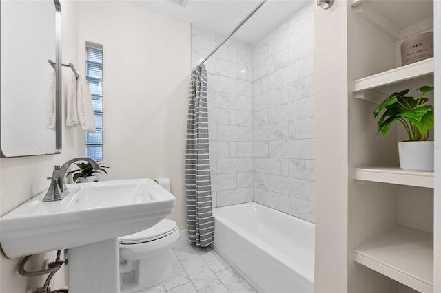 bathroom with shower / bathtub combination with curtain and toilet