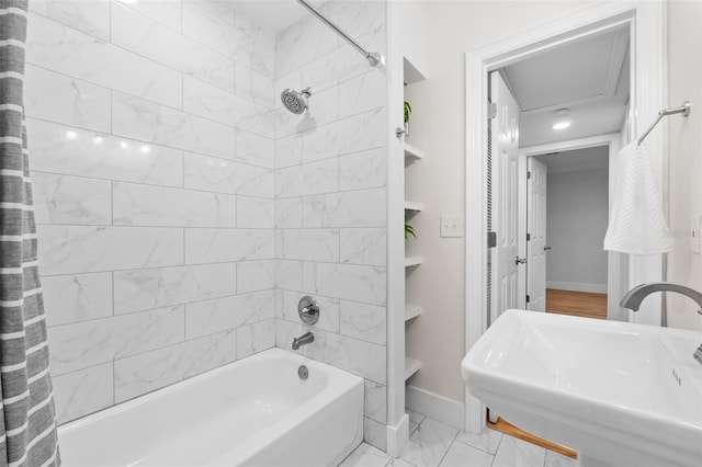 bathroom featuring sink and shower / tub combo