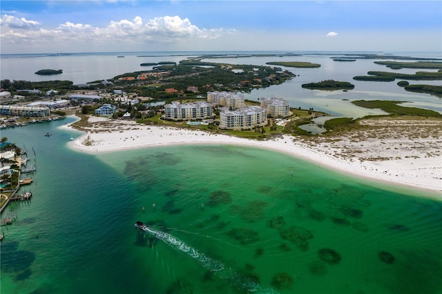 drone / aerial view with a view of the beach and a water view