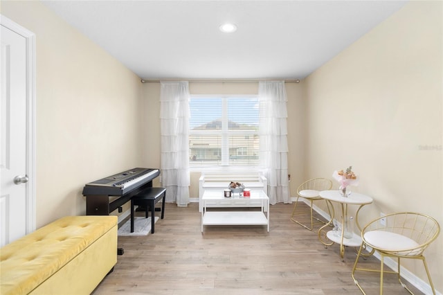 sitting room featuring light wood-type flooring